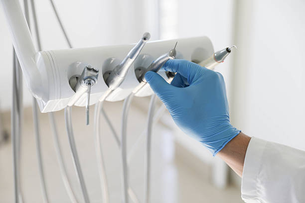 Professional Tooth Extraction technician working in East Bronson, FL